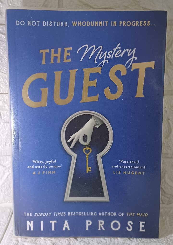 Front Cover Of The Mystery Guest (Molly the Maid, #2) (Nita Prose)