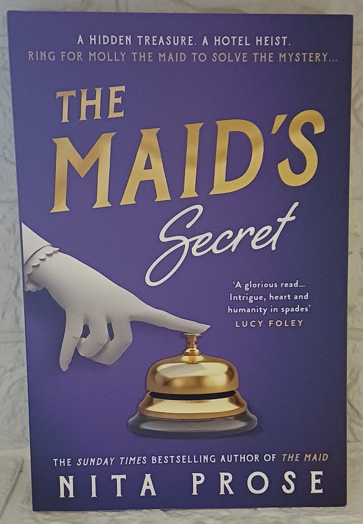 Front Cover Of The Maid's Secret (Molly the Maid, #3) (Nita Prose)