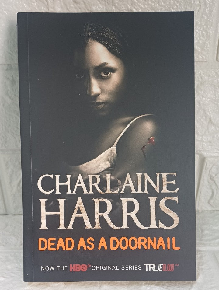 Front Cover Of Dead as a Doornail (Sookie Stackhouse, #5) (Charlaine Harris)