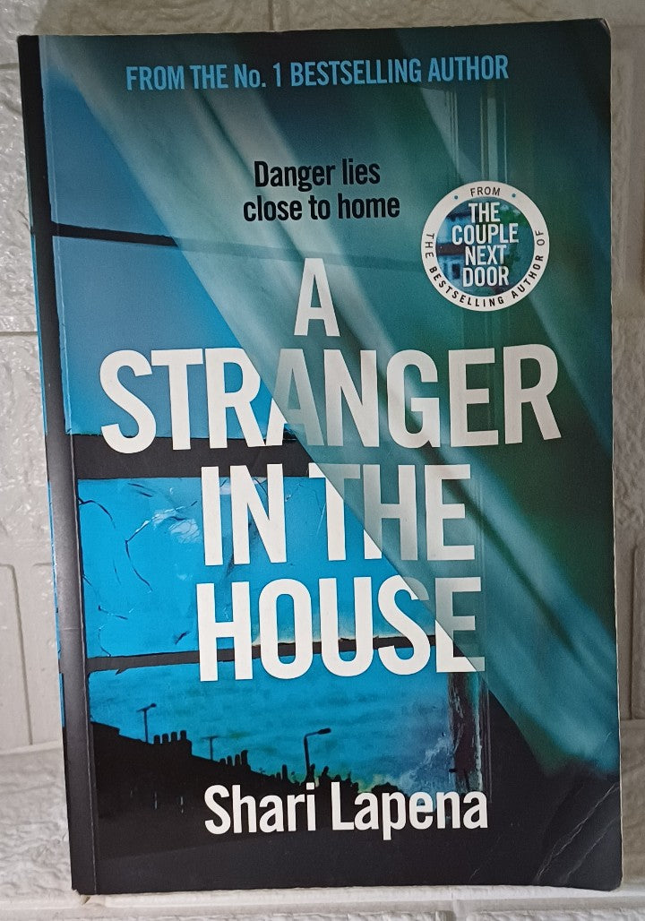 Front Cover Of A Stranger In The House (Shari Lapena)