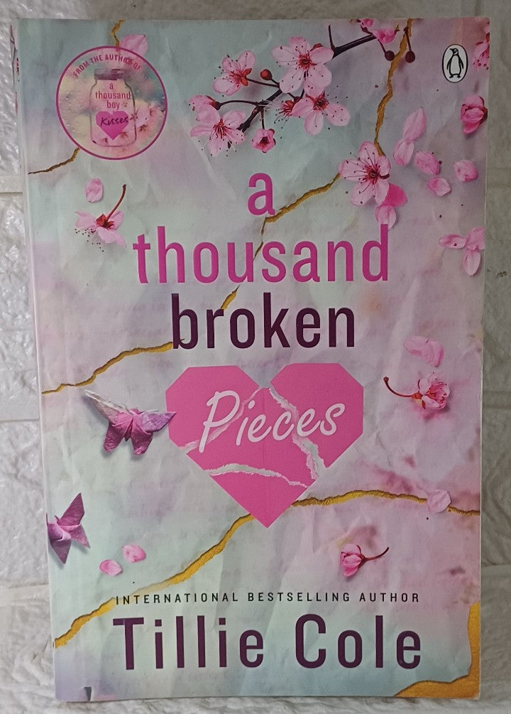 Front Cover Of A thousand broken pieces (Tillie Cole)