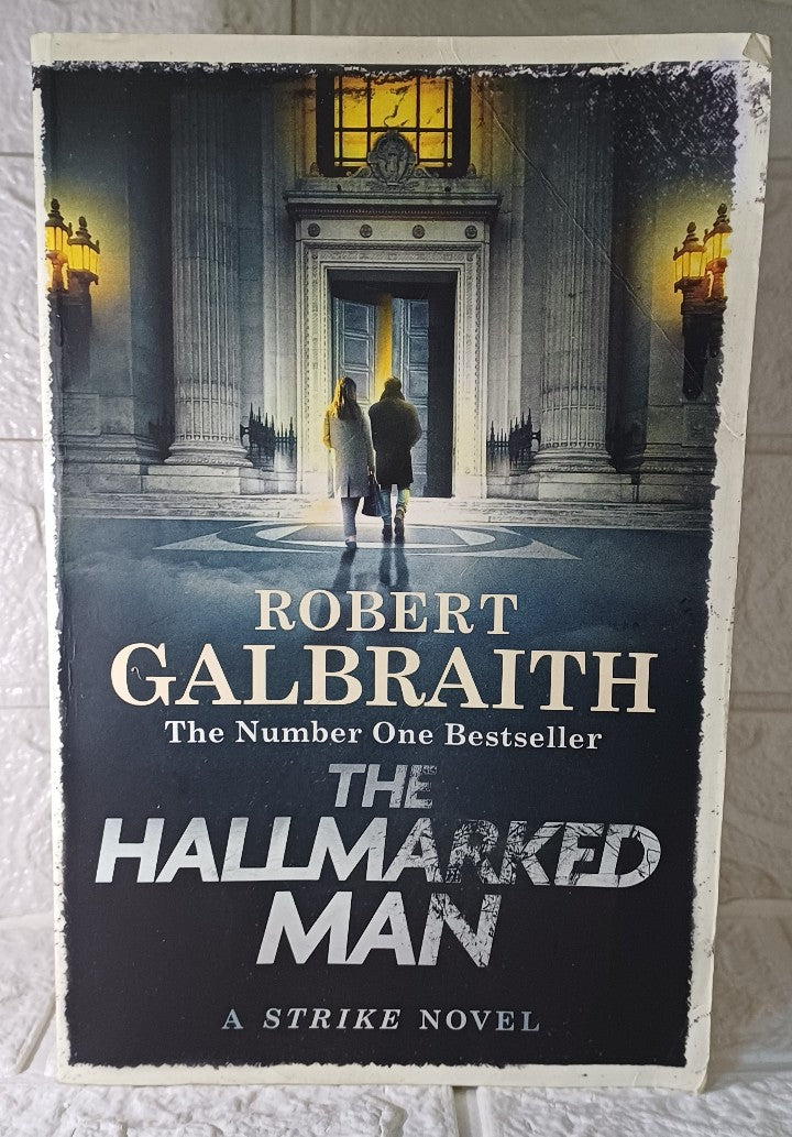 Front Cover Of The Hallmarked Man (Cormoran Strike, #8) (Robert Galbraith)