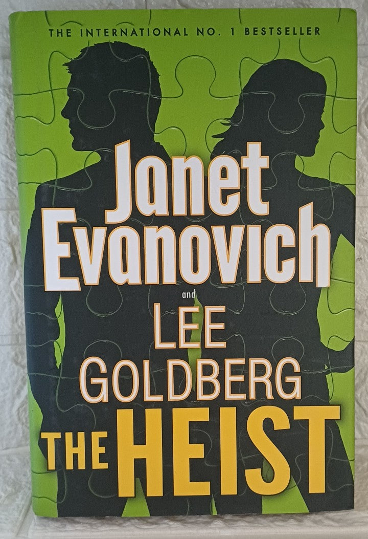Front Cover Of The Heist (O'Hare and Fox, #1) (Janet Evanovich; Lee Goldberg)