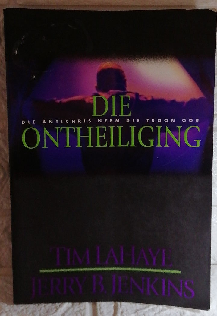 Front Cover Of Die Ontheiliging: Die Antichris Neem die Troon Oor (Hulle wat Agterbly, #9) (Monica de Jenkins)