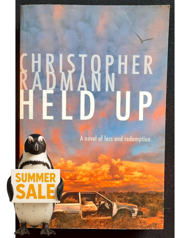 Front Cover Of Bestselling Book Held Up (Radman, Christopher)