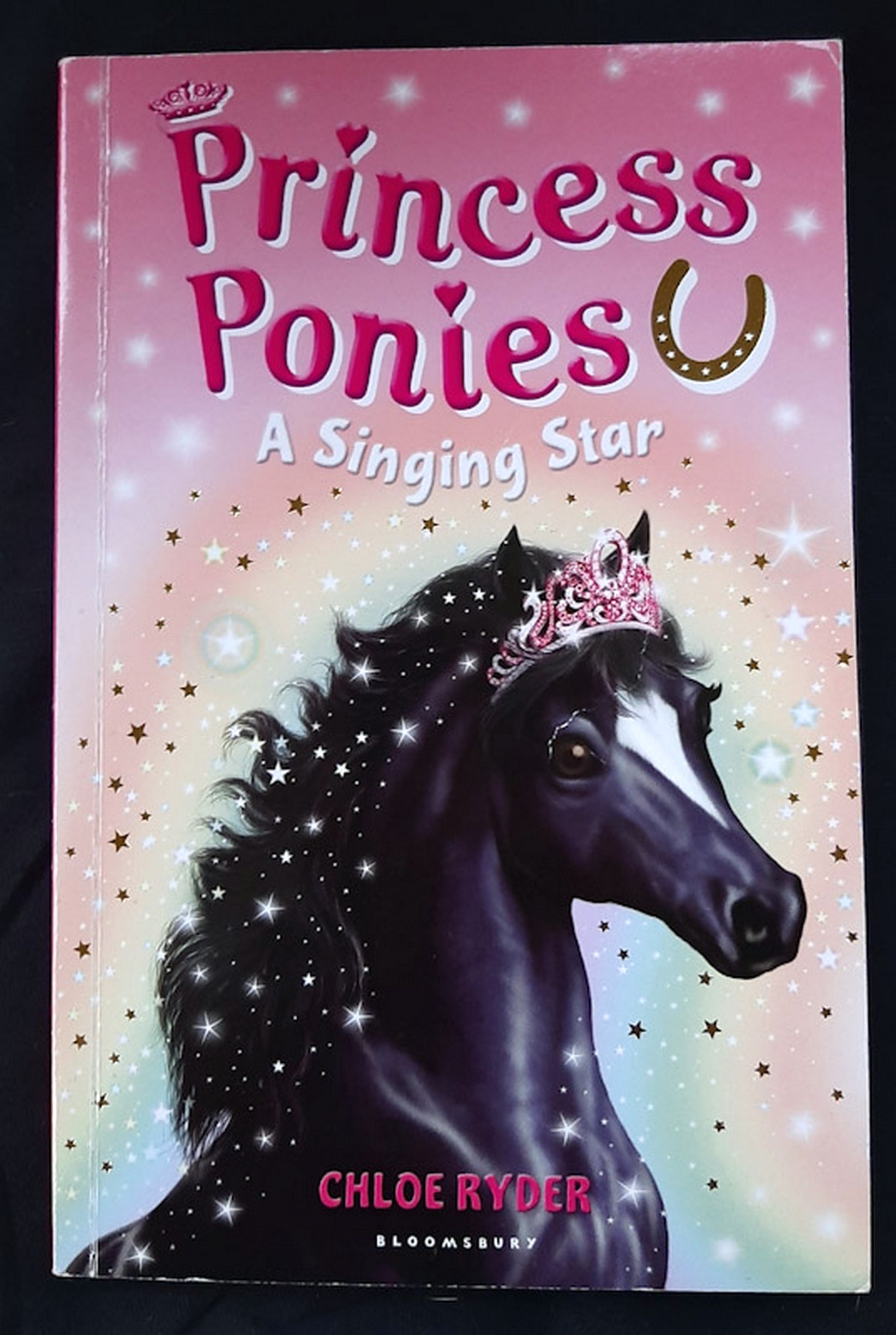 Front Cover Of A Singing Star (Princess Ponies #8) (Chloe Ryder)