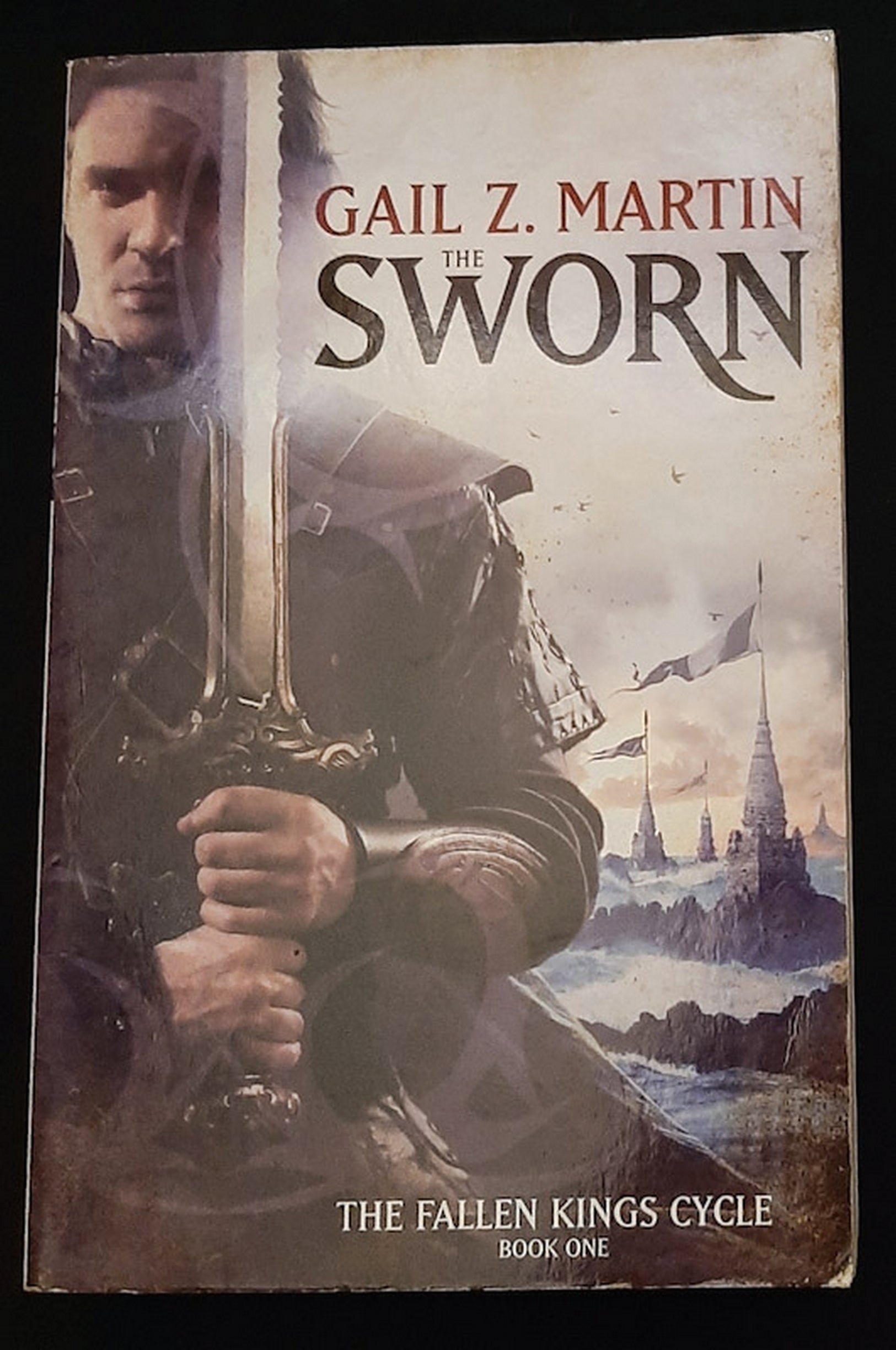 Front Cover Of The Sworn (Fallen Kings Cycle #1) (Gail Z. Martin)