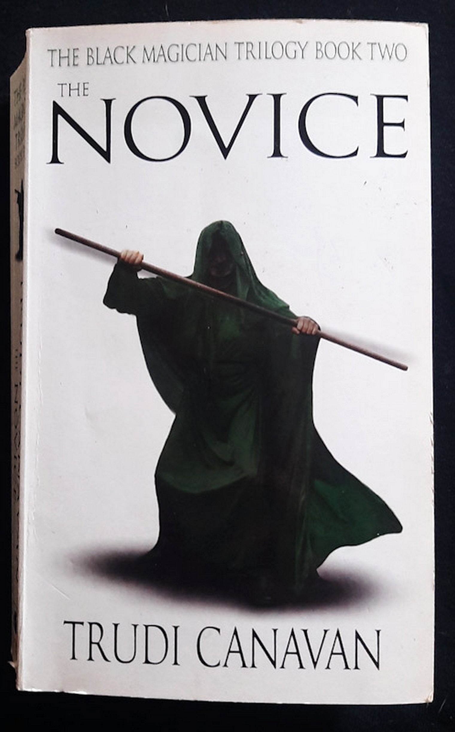 Front Cover Of The Novice (The Black Magician Trilogy #2) (Trudi Canavan)