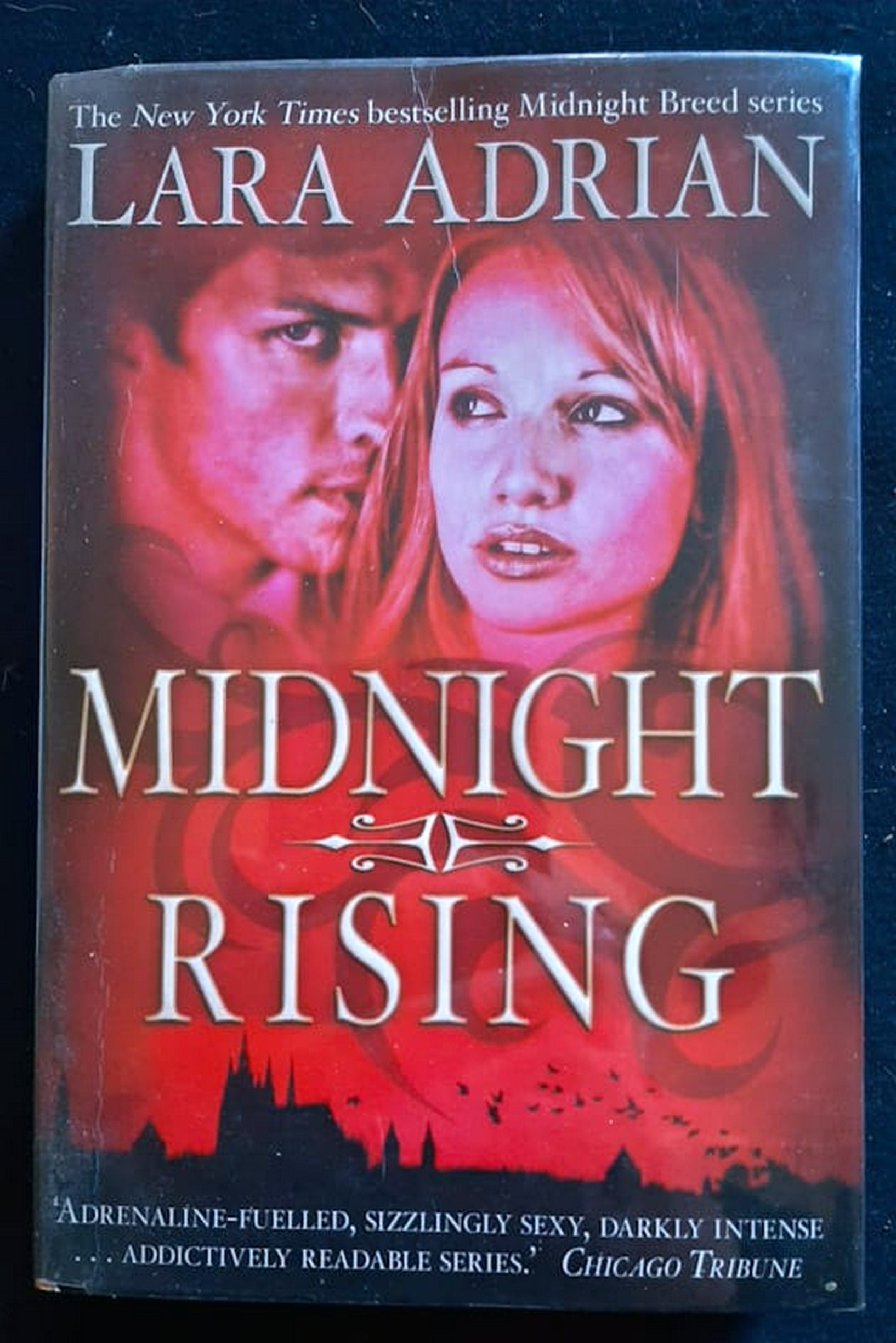 Front Cover Of Midnight Rising (Midnight Breed #4) (Lara Adrian)