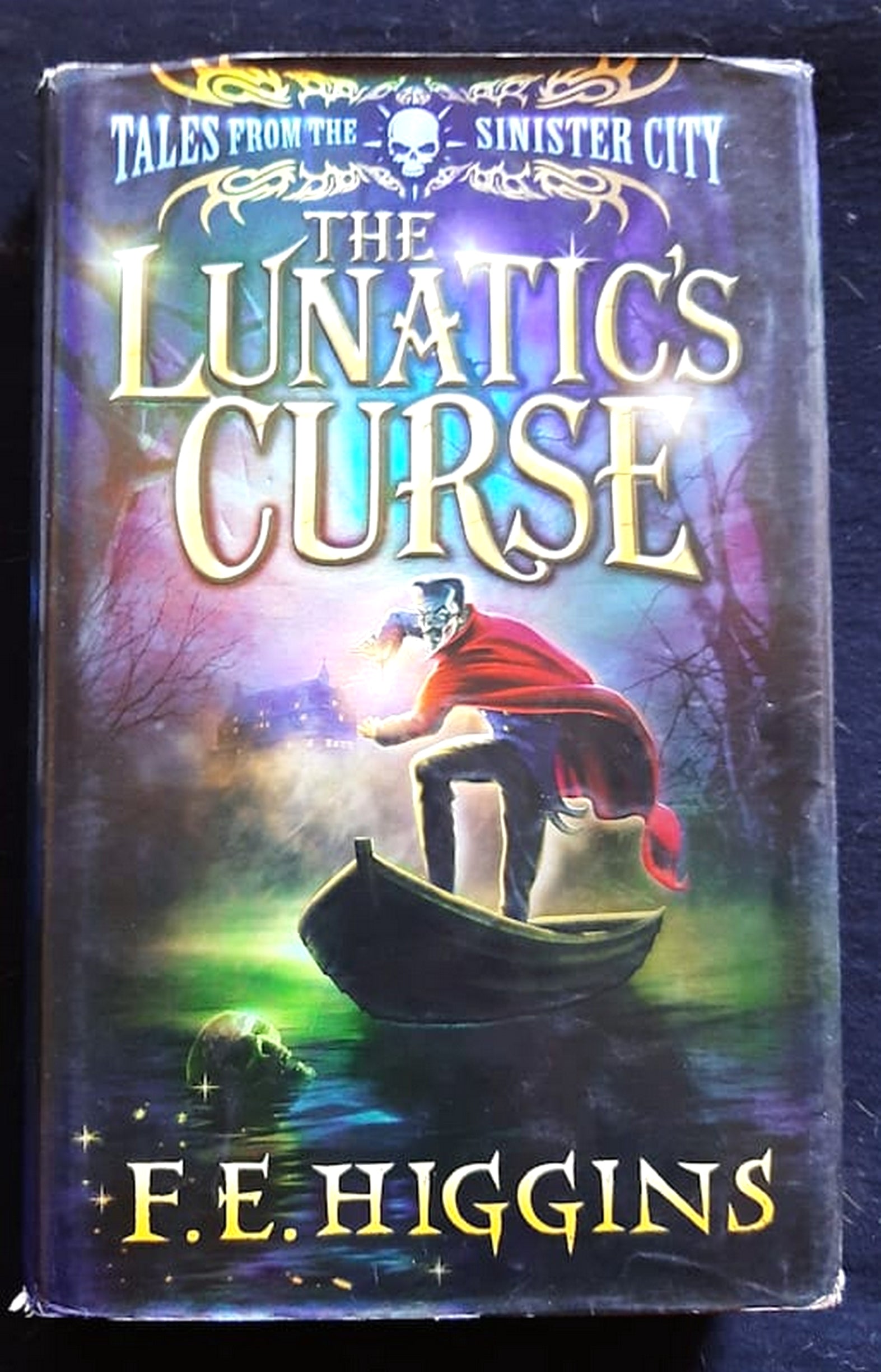 Front Cover Of The Lunatic's Curse (Tales From The Sinister City #4) (F.E. Higgins)