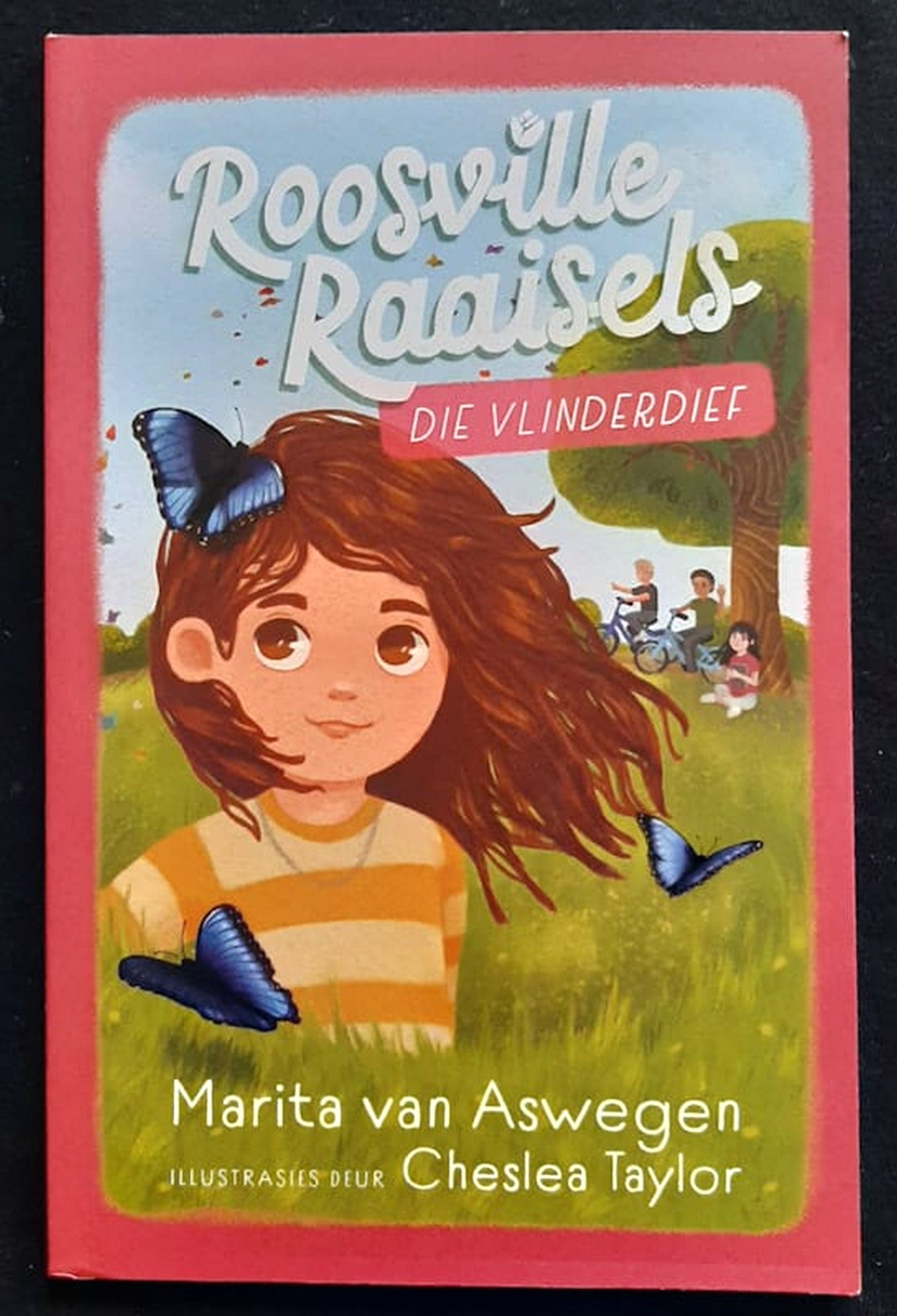 Front Cover Of Roosville Raaisels: Die vlinderdief (Marita van Aswegen)