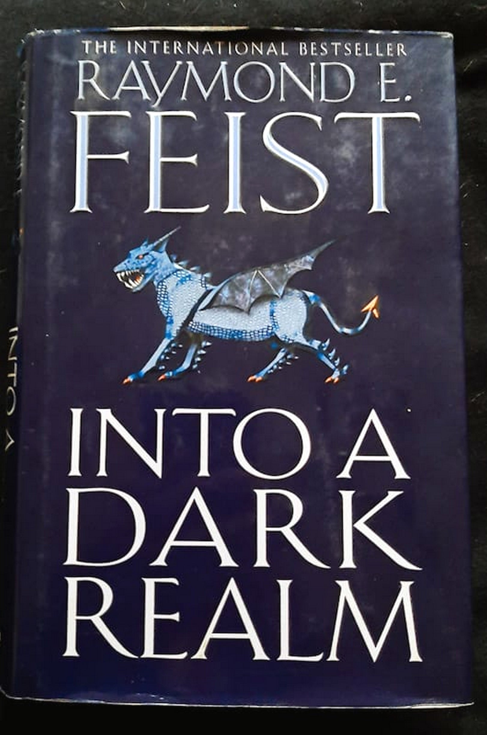 Front Cover Of Into a Dark Realm (The Darkwar Saga #2) (Raymond E. Feist)