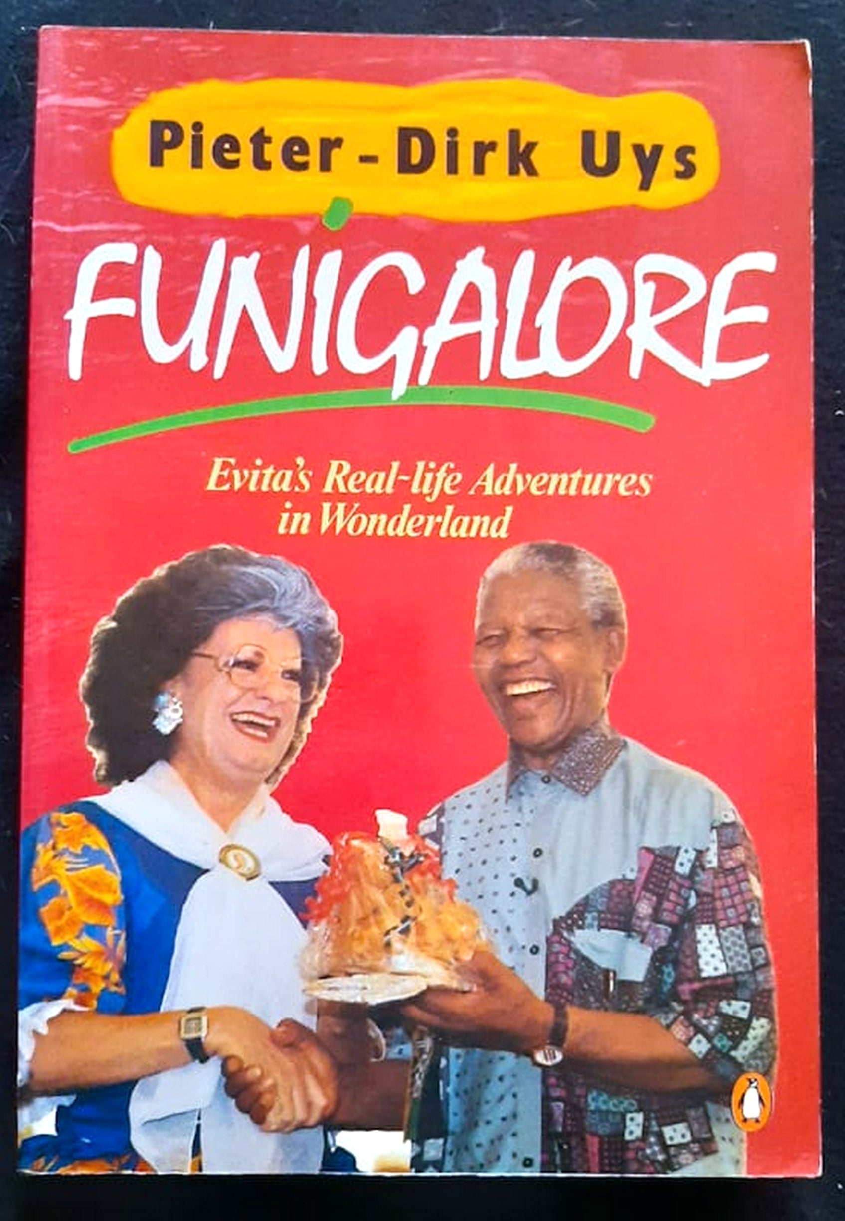 Front Cover Of Bestselling Book Funigalore: Evita'S Real-Life Adventures In Wonderland (Pieter-Dirk Uys
)