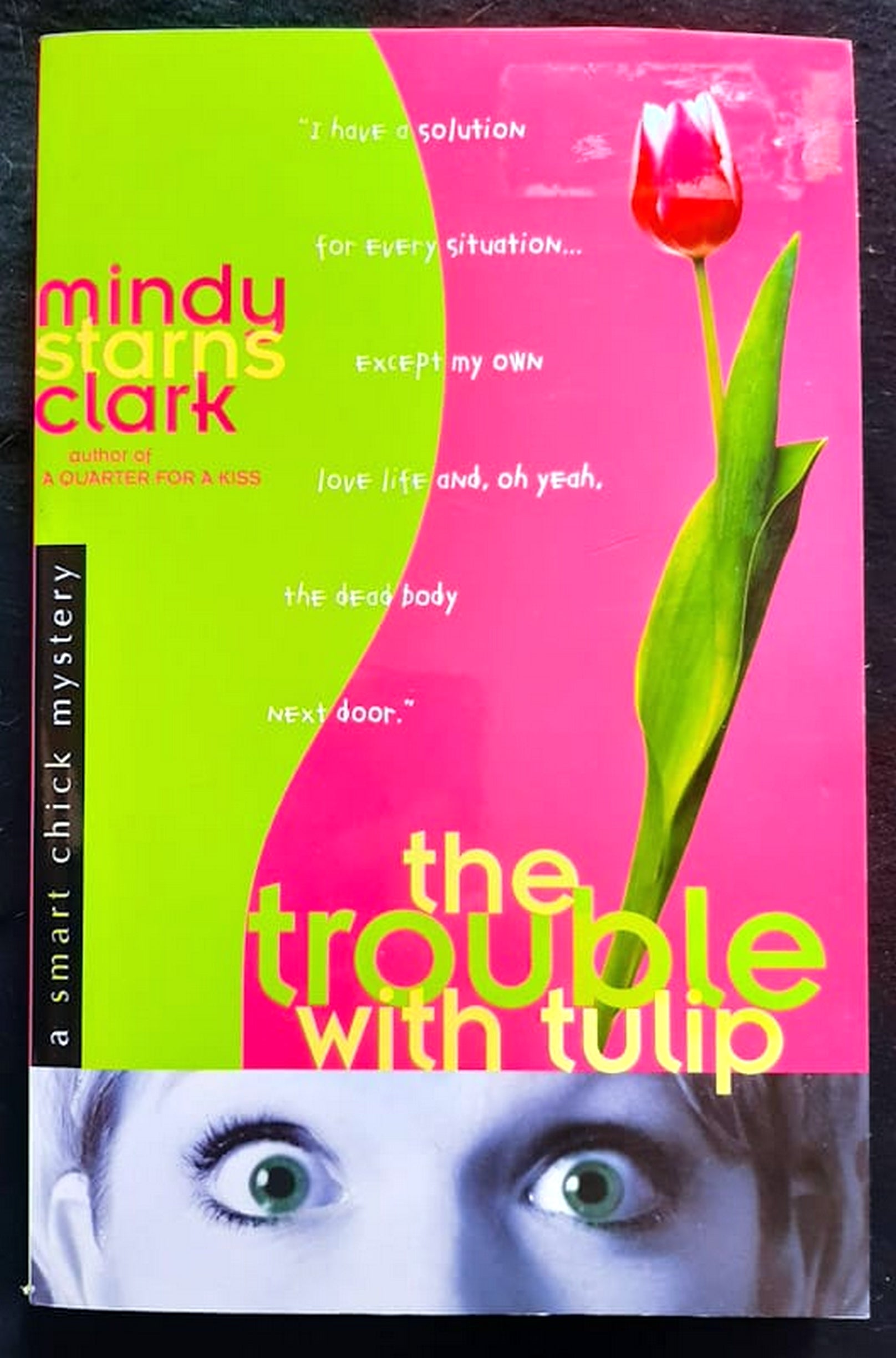 Front Cover Of Bestselling Book The Trouble With Tulip (Smart Chick Mystery #1) (Mindy Starns Clark
)