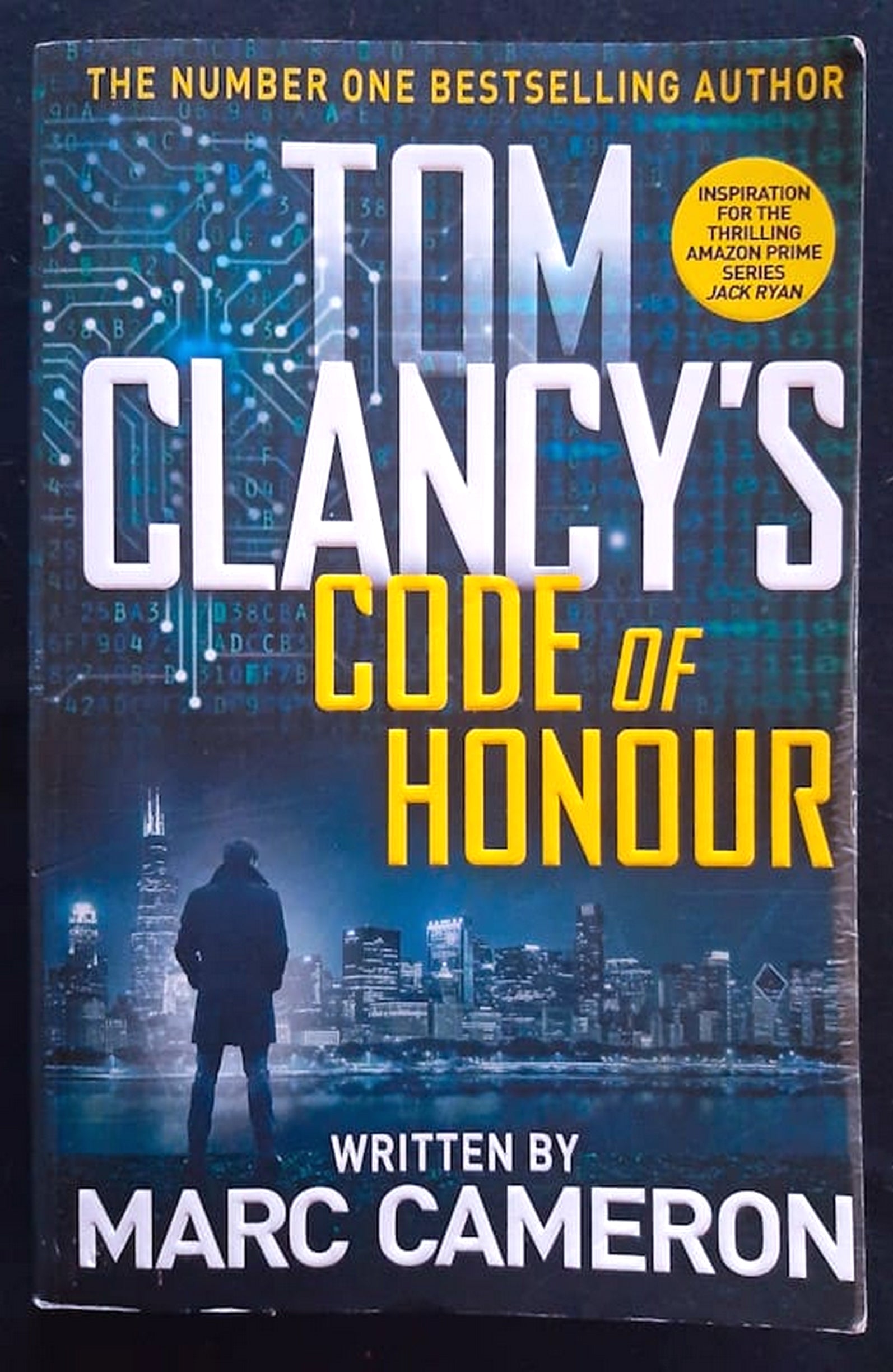 Front Cover Of Bestselling Book Tom Clancy'S Code Of Honour (Jack Ryan Universe #29) (Marc Cameron
)
