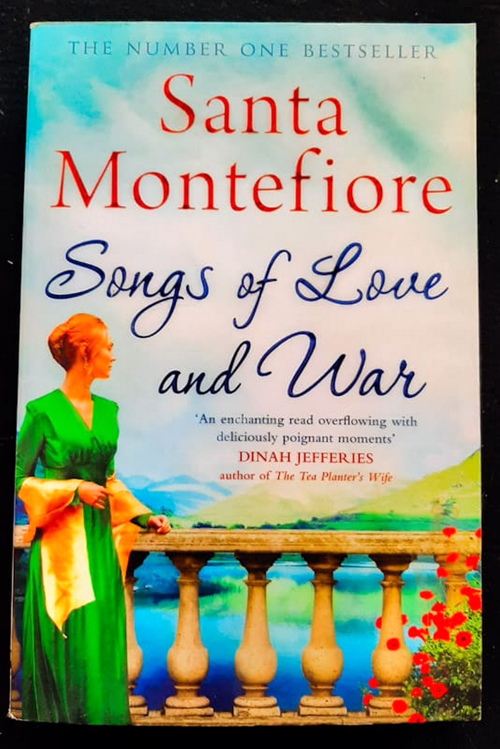 Front Cover Of Bestselling Book Songs Of Love And War (Deverill Chronicles #1) (Santa Montefiore
)