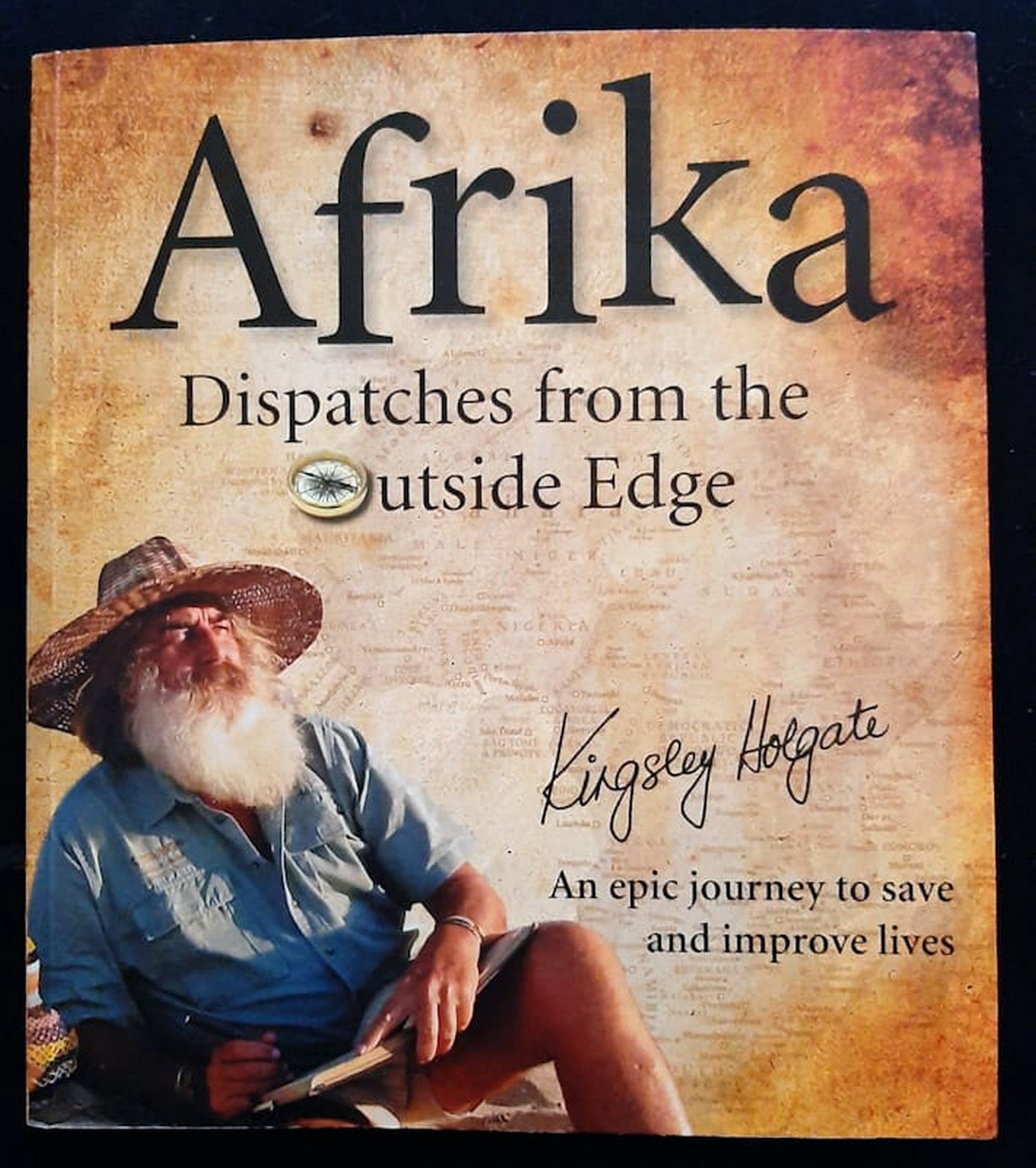 Front Cover Of Bestselling Book Afrika Dispatches From The Outside Edge - An Epic Journey To Save And Improve Lives (Kingsley Holgate
)