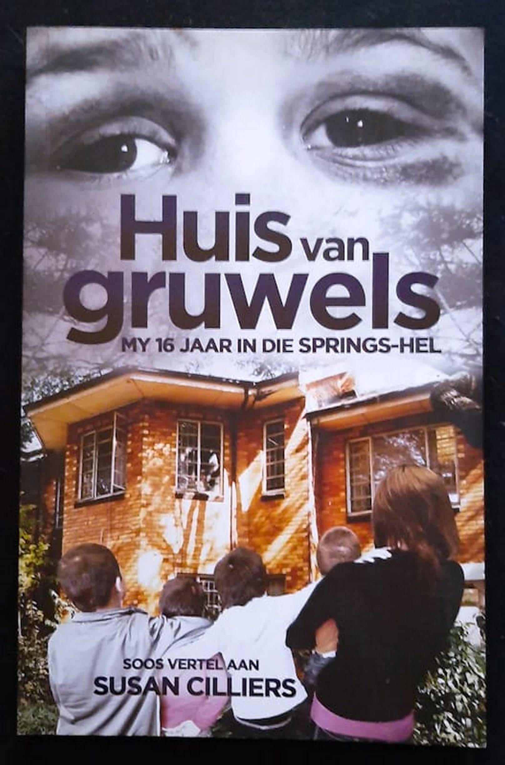 Front Cover Of Bestselling Book Huis Van Gruwels: My 16 Jaar In Die Springs-Hel (Susan Cilliers
)