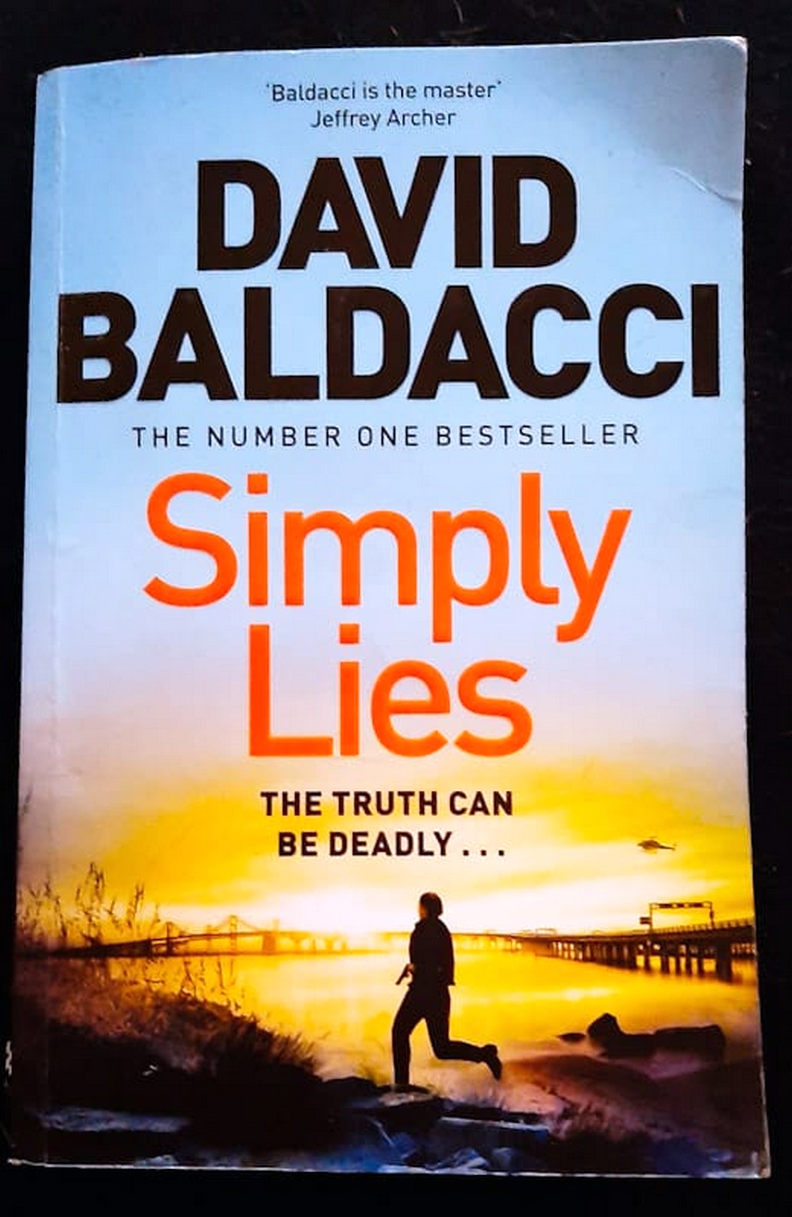 Front Cover Of Bestselling Book Simply Lies (Mickey Gibson #1) (David Baldacci
)