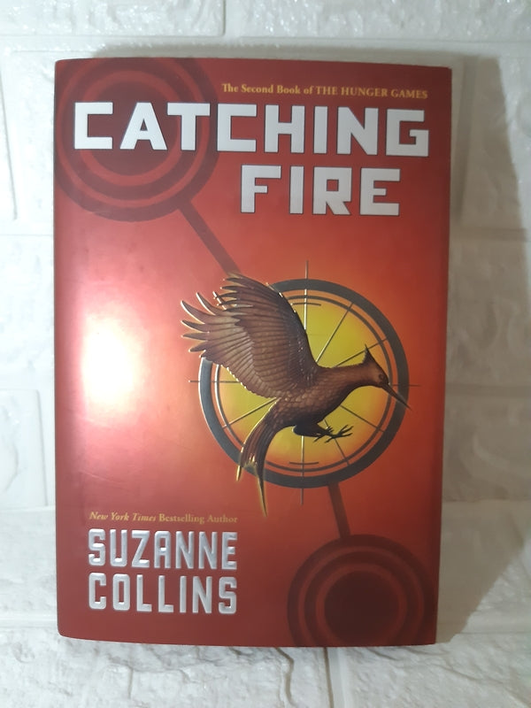 Front Cover Of Catching ​Fire (Suzanne Collins)