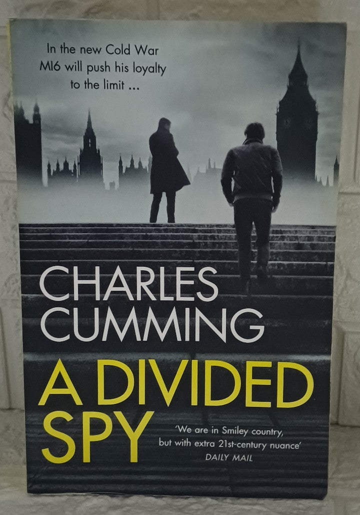 Front Cover Of A Divided Spy (Thomas Kell, #3) (Charles Cumming)