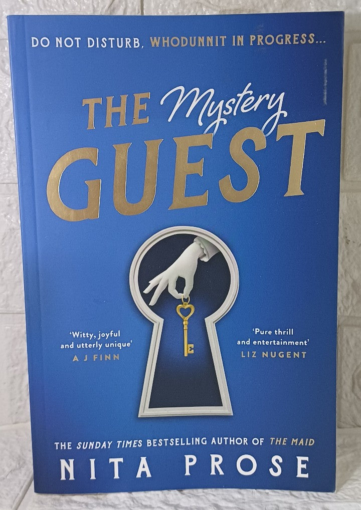 Front Cover Of The Mystery Guest (Molly the Maid, #2) (Nita Prose)