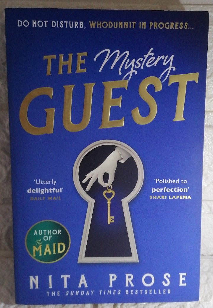 Front Cover Of The mystery guest (molly the maid book 2) (Nita Prose)