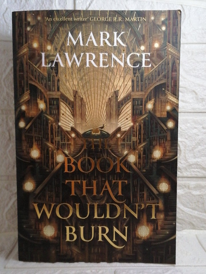 Front Cover Of The Book That Wouldn’t Burn (The Library Trilogy, #1)