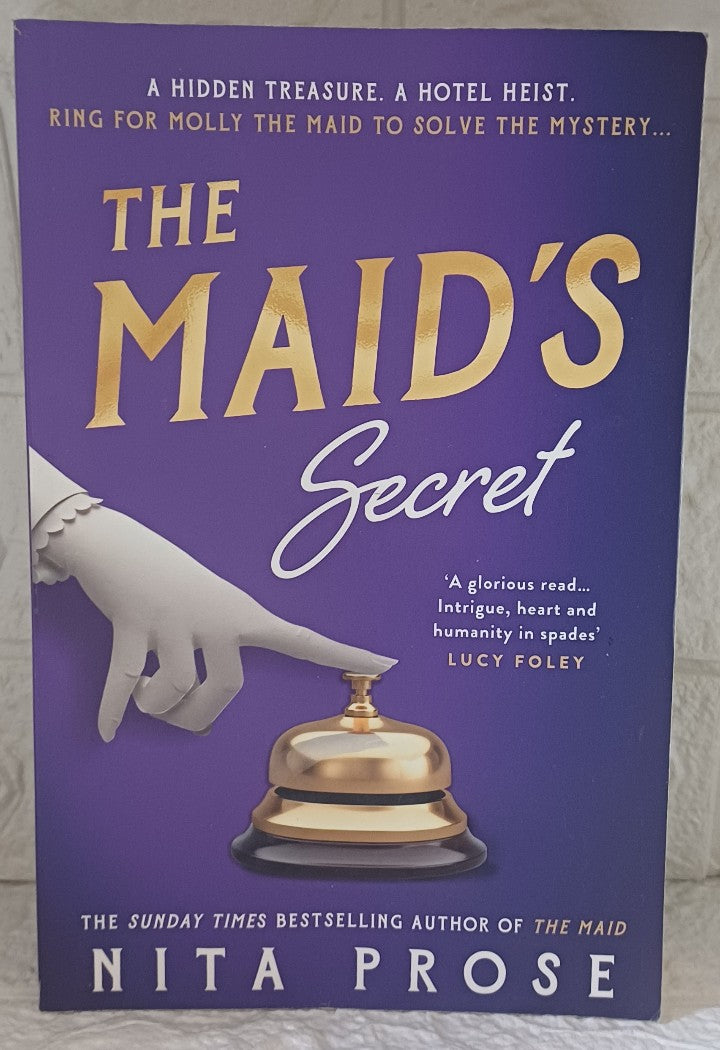 Front Cover Of The Maid's Secret (Molly the Maid, #3) (Nita Prose)