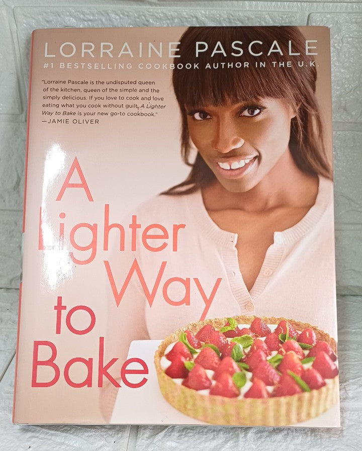 Front Cover Of A Lighter Way to Bake: 100 Healthier Recipes with Everyday Ingredients for Guilt-Free Indulgences (Lorraine Pascale)