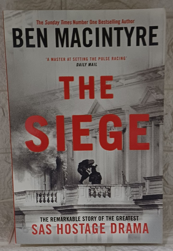 Front Cover Of The Siege: A Six-Day Hostage Crisis and the Daring Special-Forces Operation That Shocked the World (Ben Macintyre)
