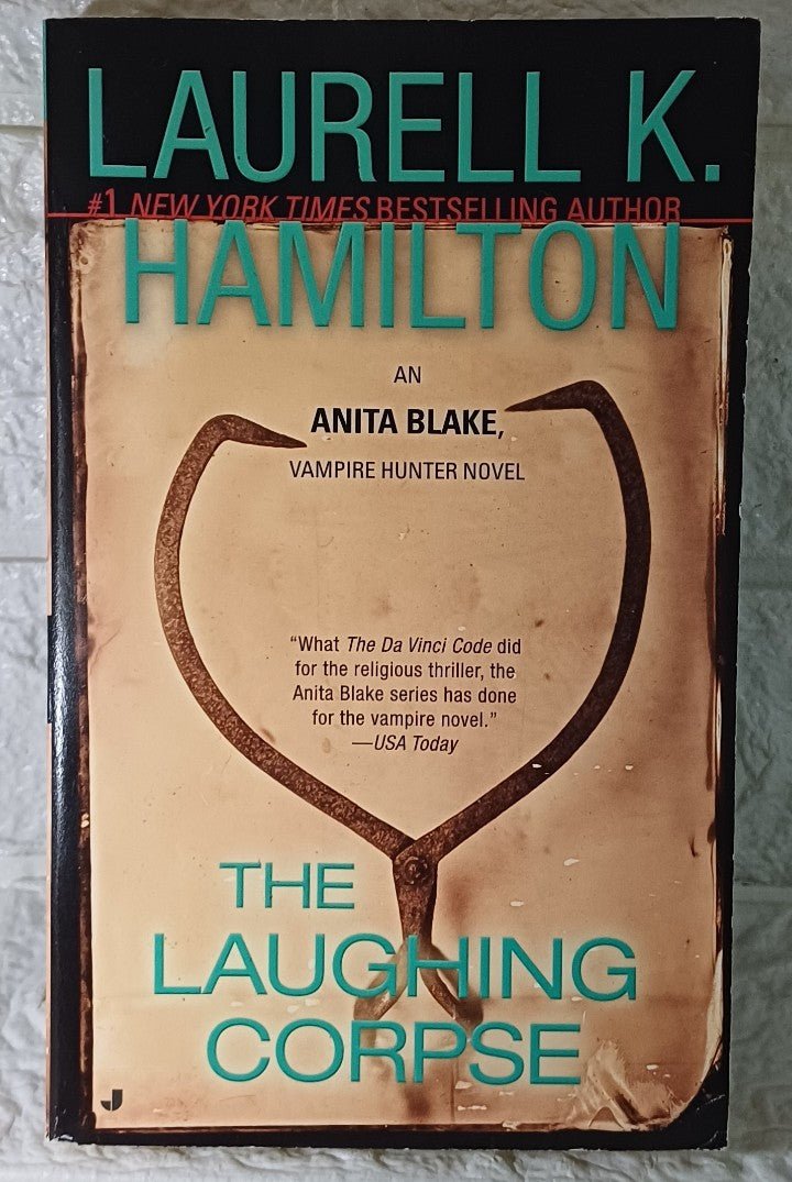 Front Cover Of The Laughing Corpse (Anita Blake, Vampire Hunter, #2) (Laurell K. Hamilton)