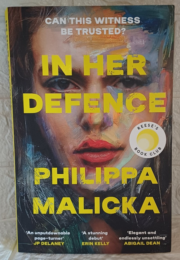 Front Cover Of In her defense (Phillippa Malicka)