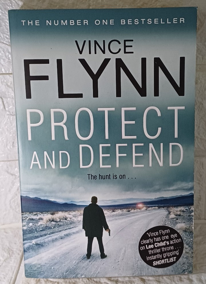 Front Cover Of Protect And Defend (Mitch Rapp, #10) (Vince Flynn)