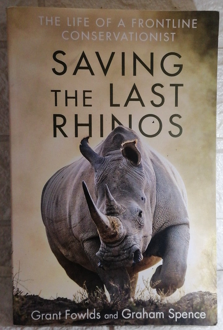 Front Cover Of Saving the Last Rhinos (Graham Fowlds)