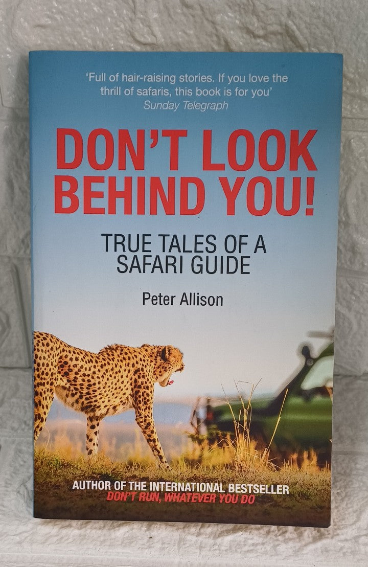 Front Cover Of Don't Look Behind You!: True Tales of a Safari Guide (Peter Allison)