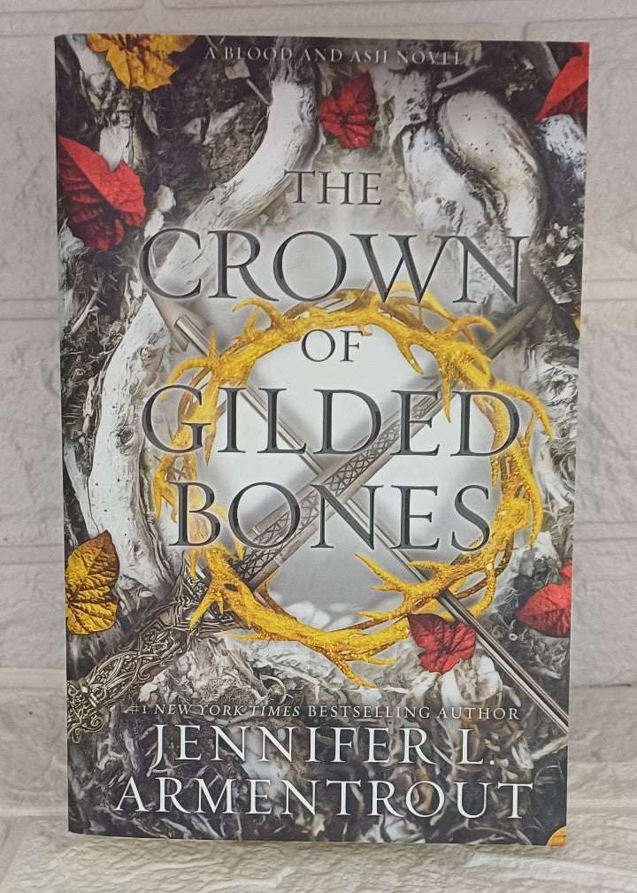 Front Cover Of The ​Crown of Gilded Bones (Blood and Ash, #3) (Jennifer L. Armentrou