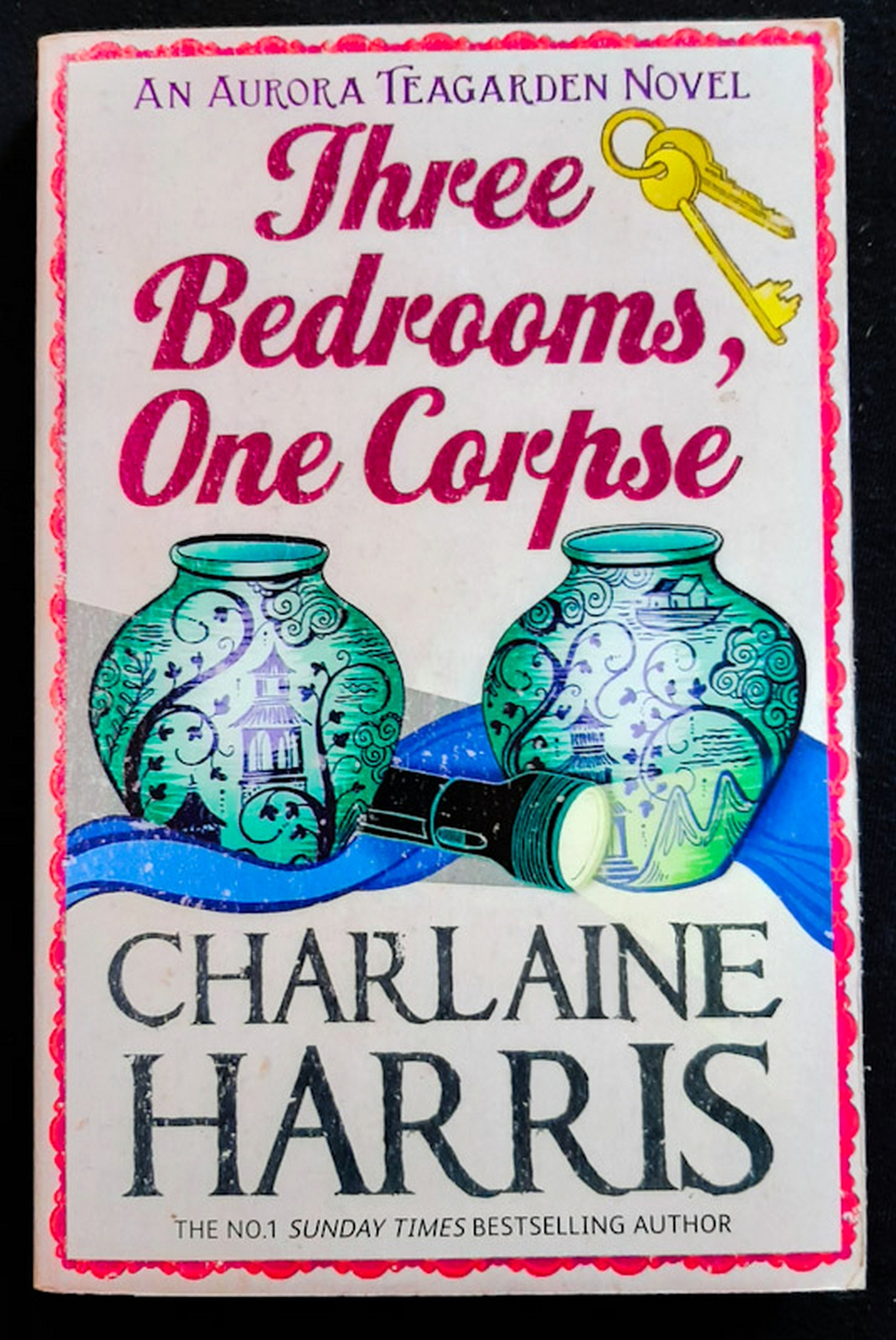 Front Cover Of Three Bedrooms, One Corpse (Aurora Teagarden #3) (Charlaine Harris)