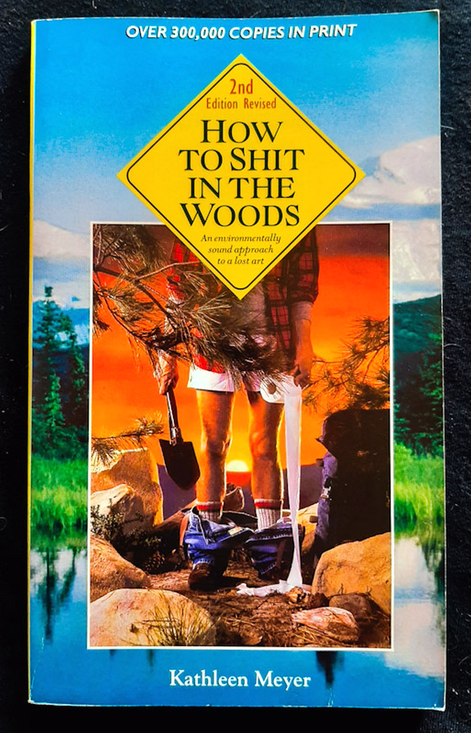 Front Cover Of How to Shit in the Woods: An Environmentally Sound Approach to a Lost Art (Kathleen Meyer)