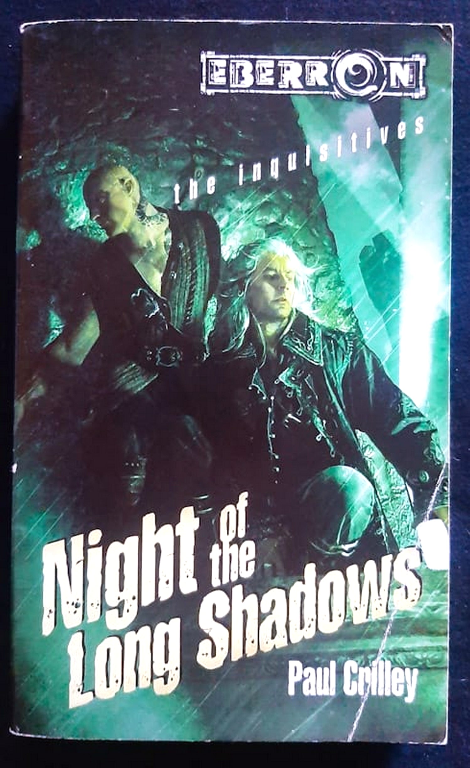 Front Cover Of Night of the Long Shadows: The Inquisitives, Book 2 (Eberron) (Paul Crilley)