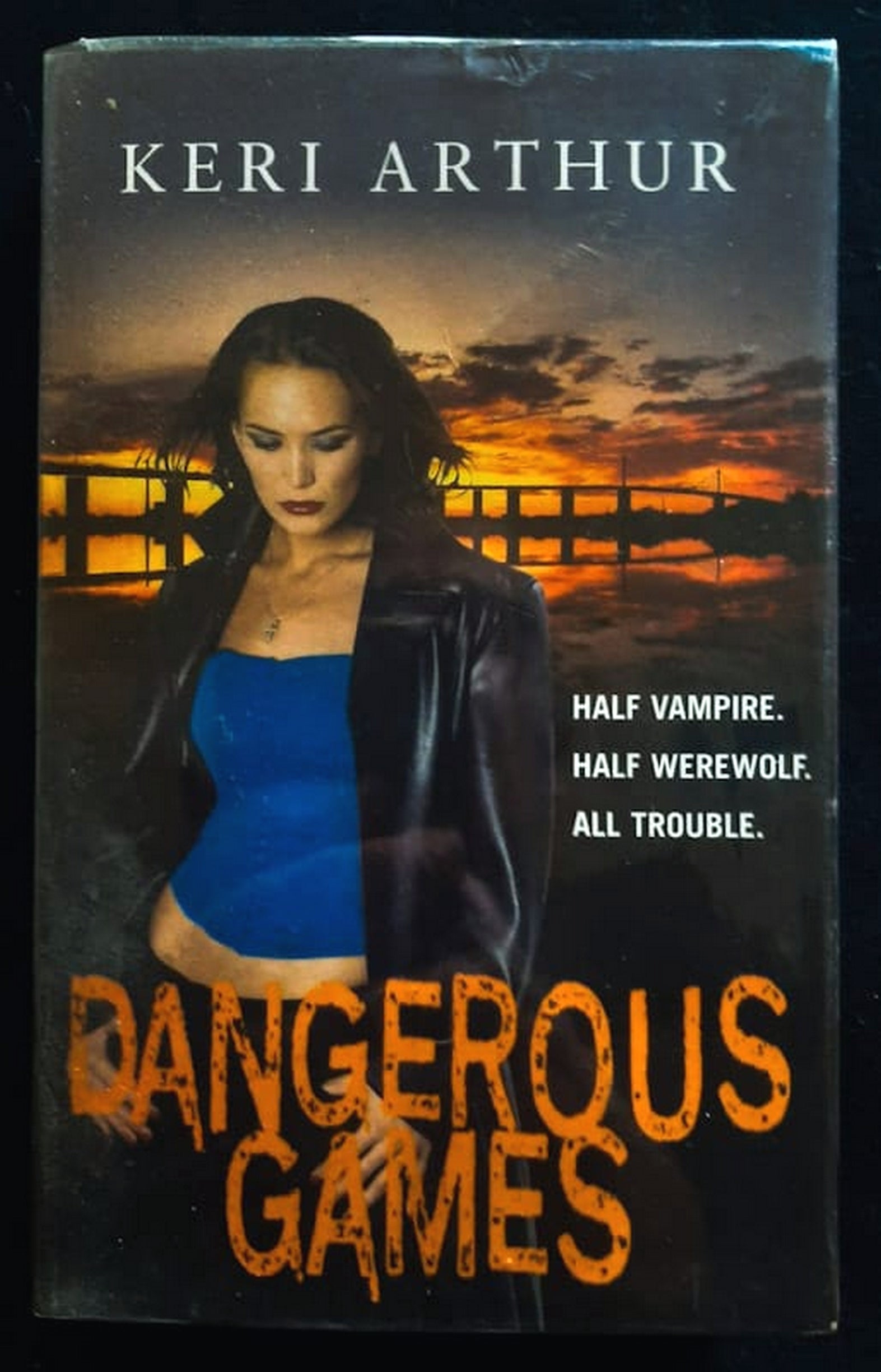 Front Cover Of Dangerous Games (Riley Jenson Guardian #4) (Keri Arthur)