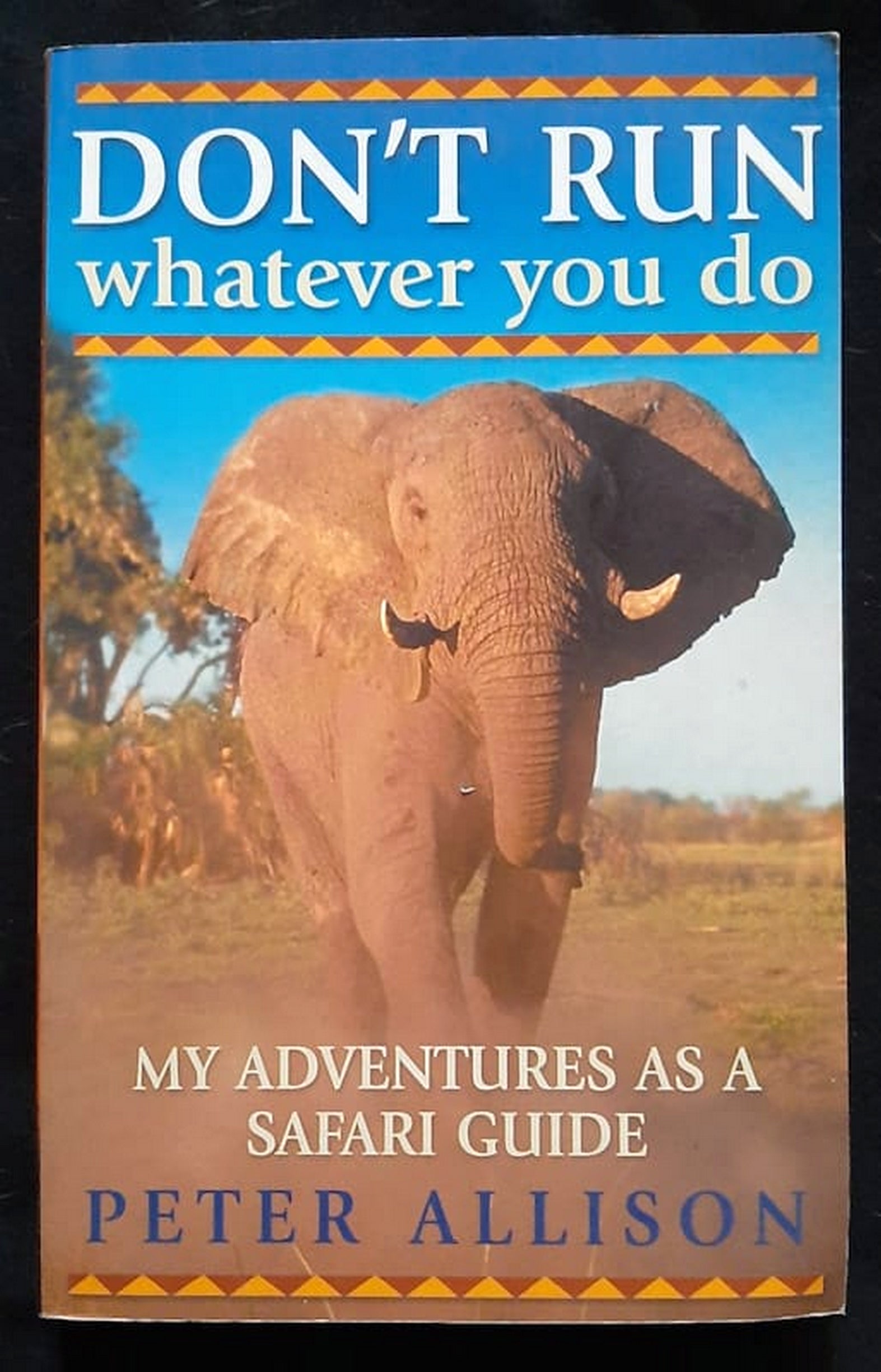 Front Cover Of Don't Run, Whatever You Do: My Adventures as a Safari Guide (Peter Allison)