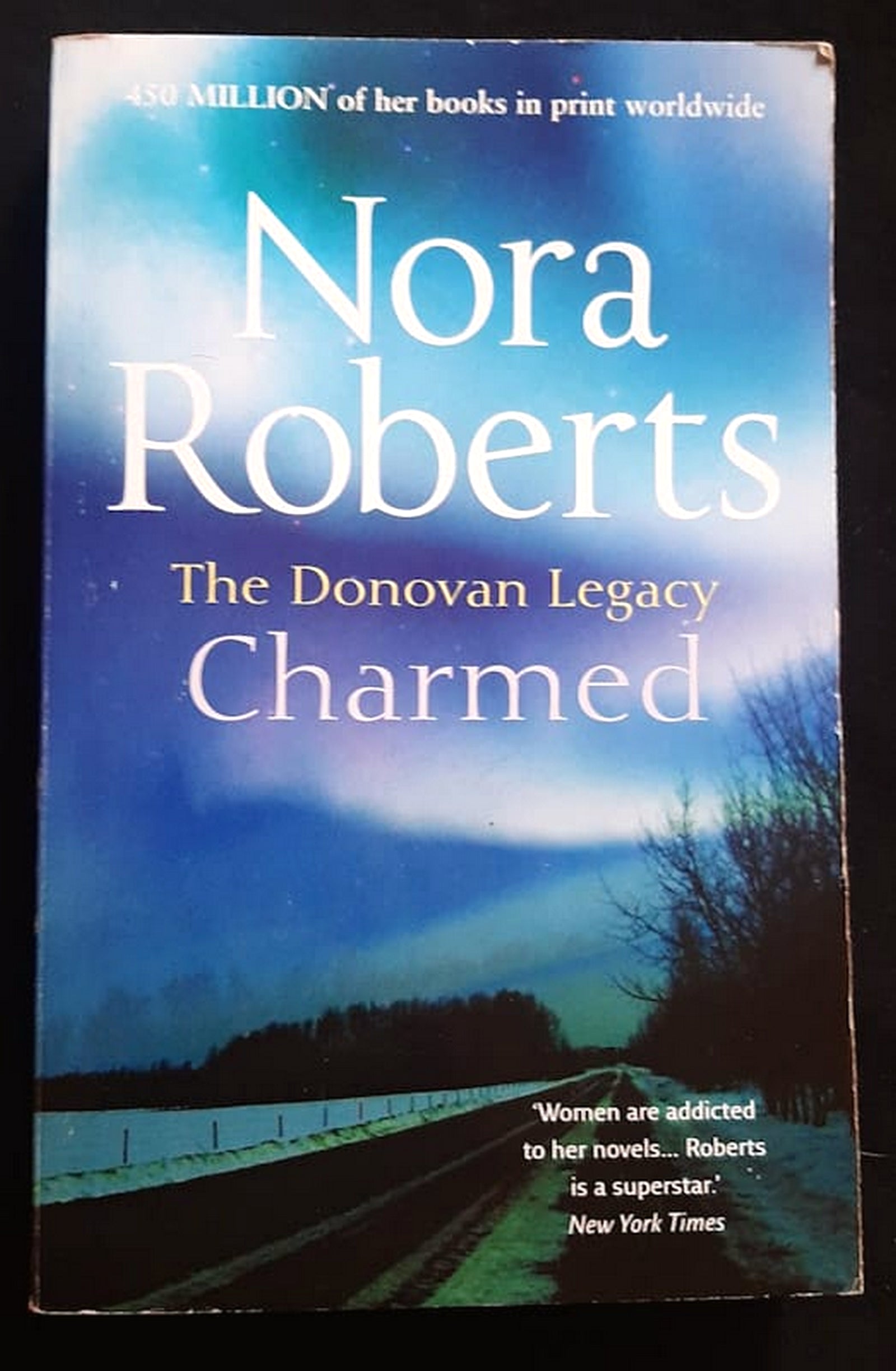 Front Cover Of Bestselling Book Charmed (The Donovan Legacy #3) (Nora Roberts
)