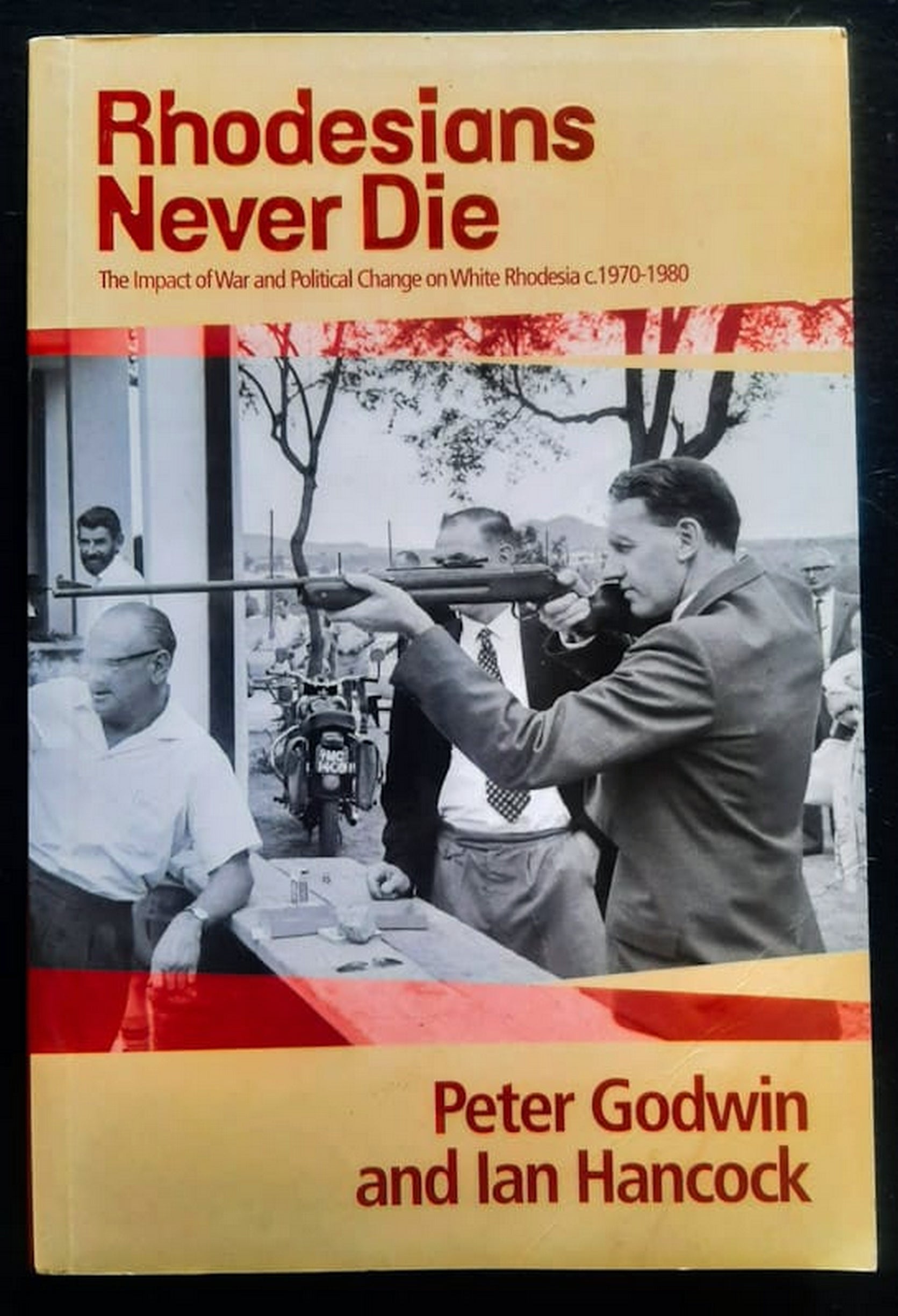 Front Cover Of Bestselling Book Rhodesians Never Die (Peter Godwin
)