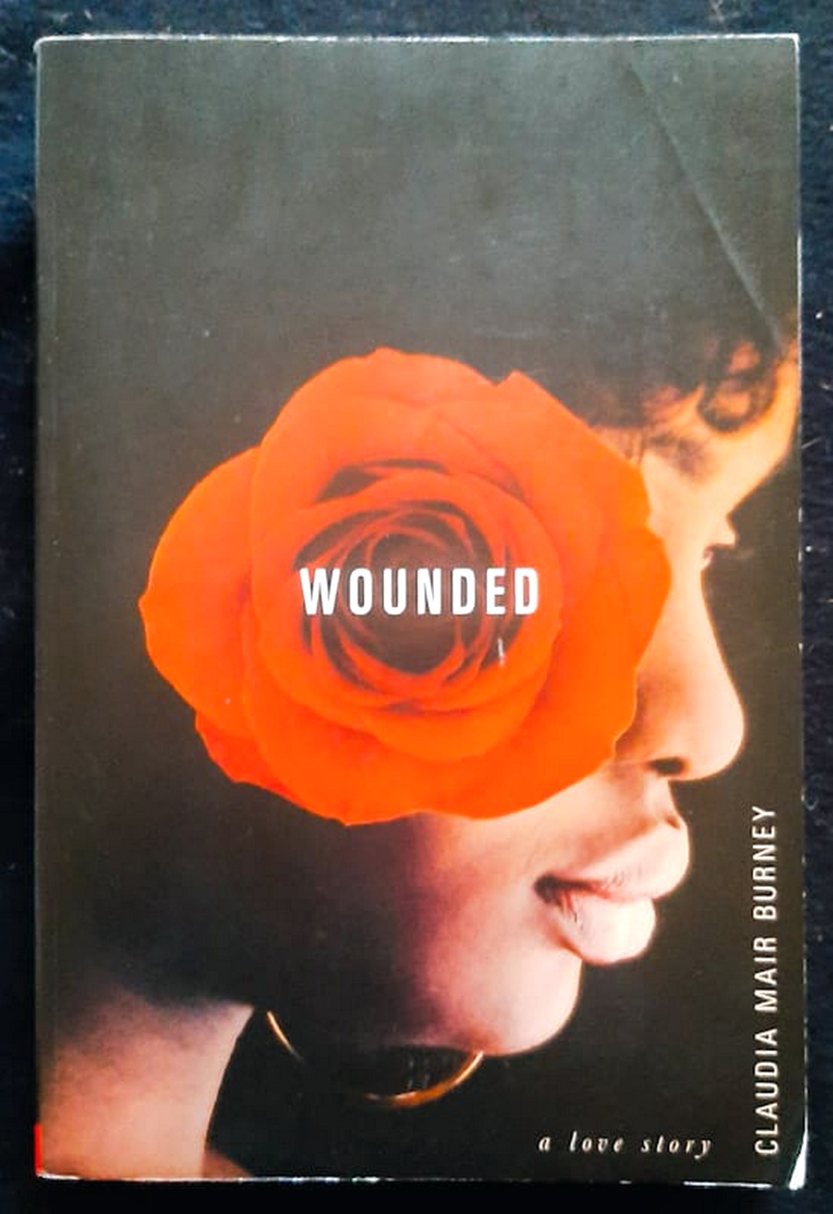 Front Cover Of Bestselling Book Wounded: A Love Story (Claudia Mair Burney
)