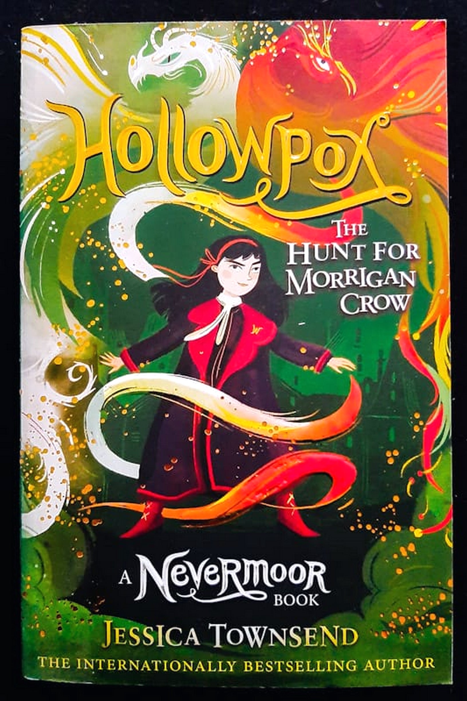 Front Cover Of Bestselling Book Hollowpox: The Hunt For Morrigan Crow (Nevermoor #3) (Jessica Townsend
)