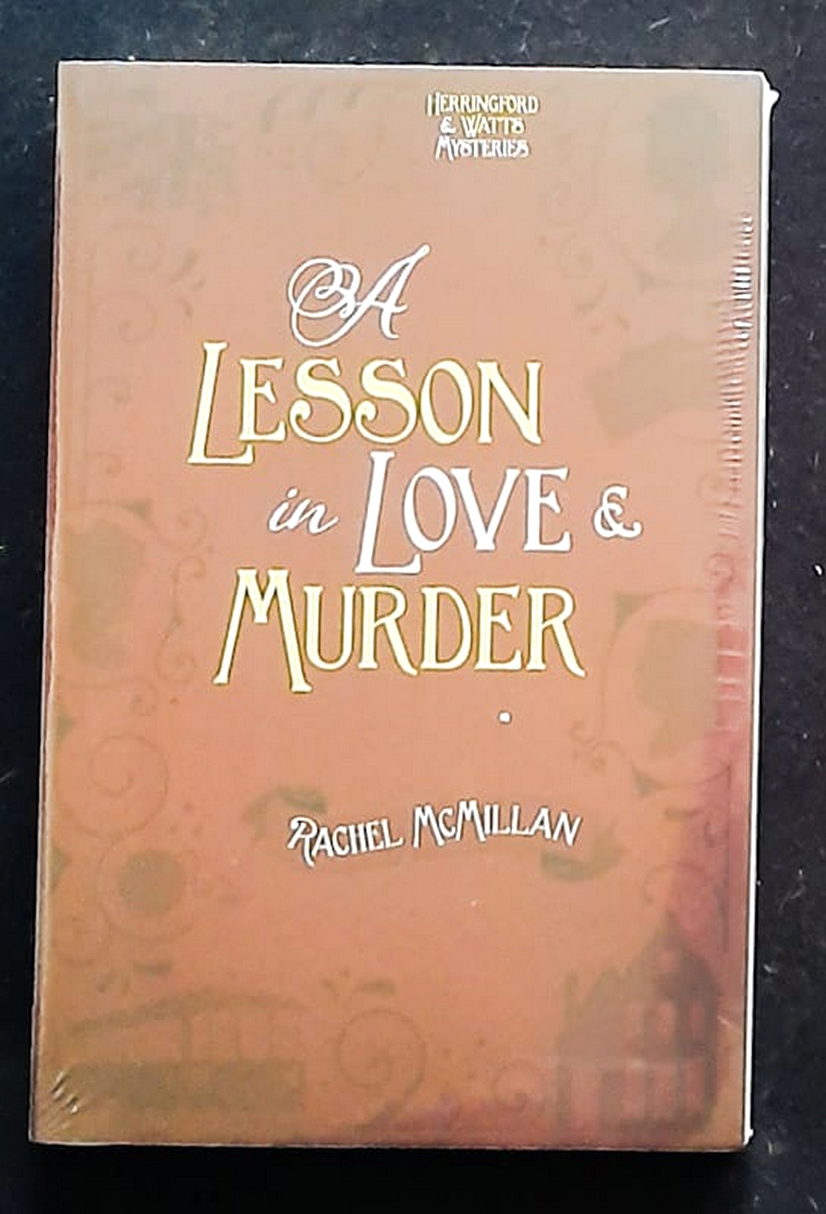 Front Cover Of Bestselling Book A Lesson In Love And Murder (Herringford And Watts Mysteries #2) (Rachel Mcmillan
)