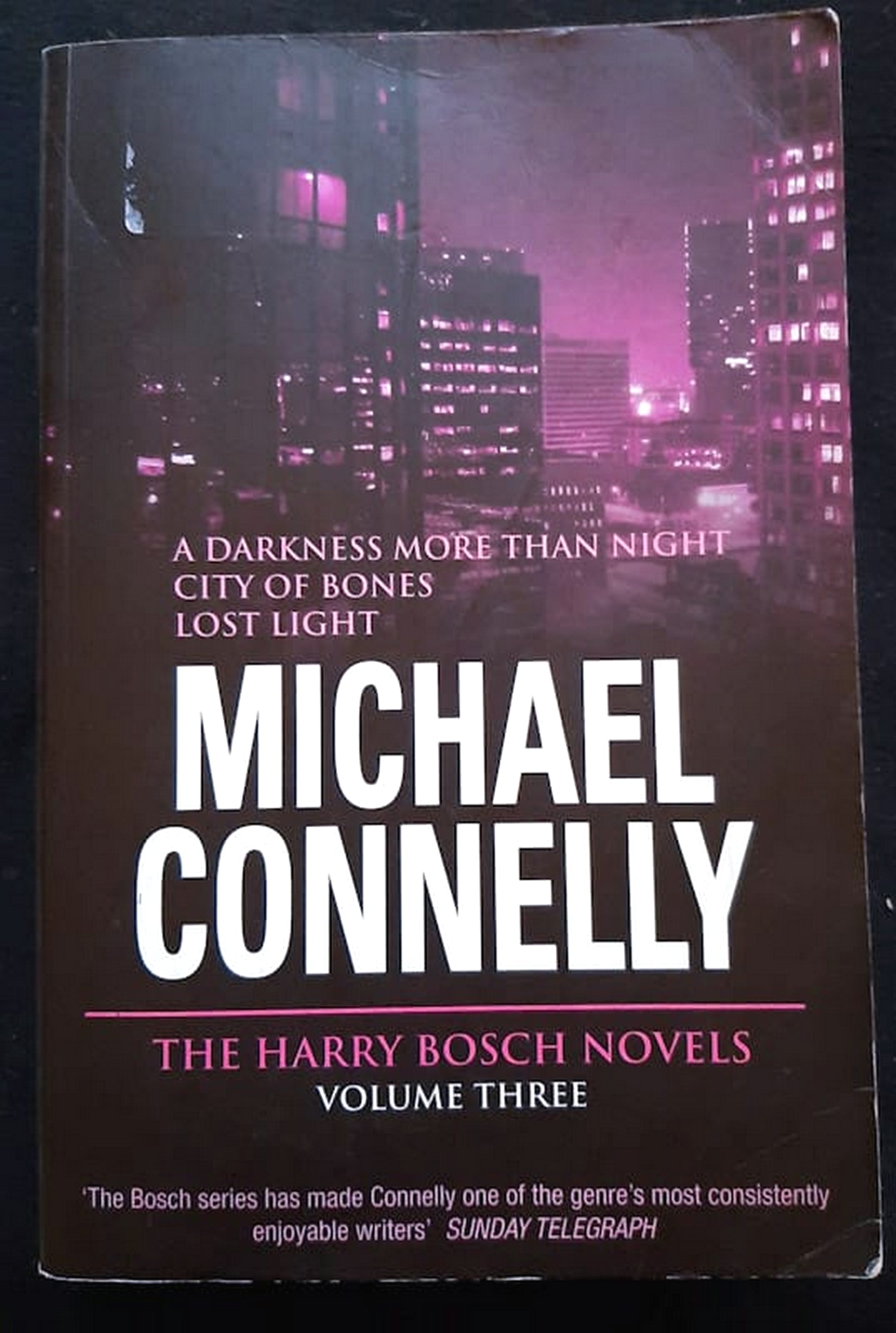 Front Cover Of Bestselling Book The Harry Bosch Novels, Volume 3: A Darkness More Than Night / City Of Bones / Lost Light (Michael Connelly
)