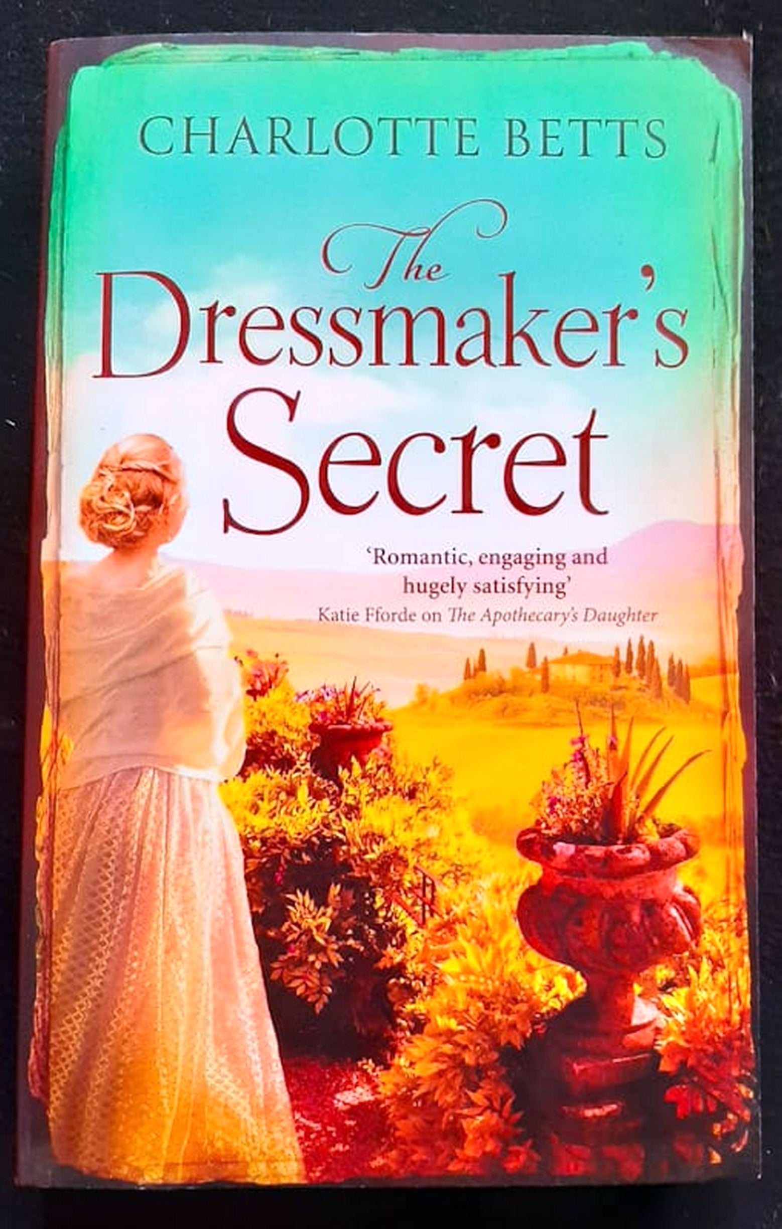 Front Cover Of Bestselling Book The Dressmaker'S Secret (Charlotte Betts
)