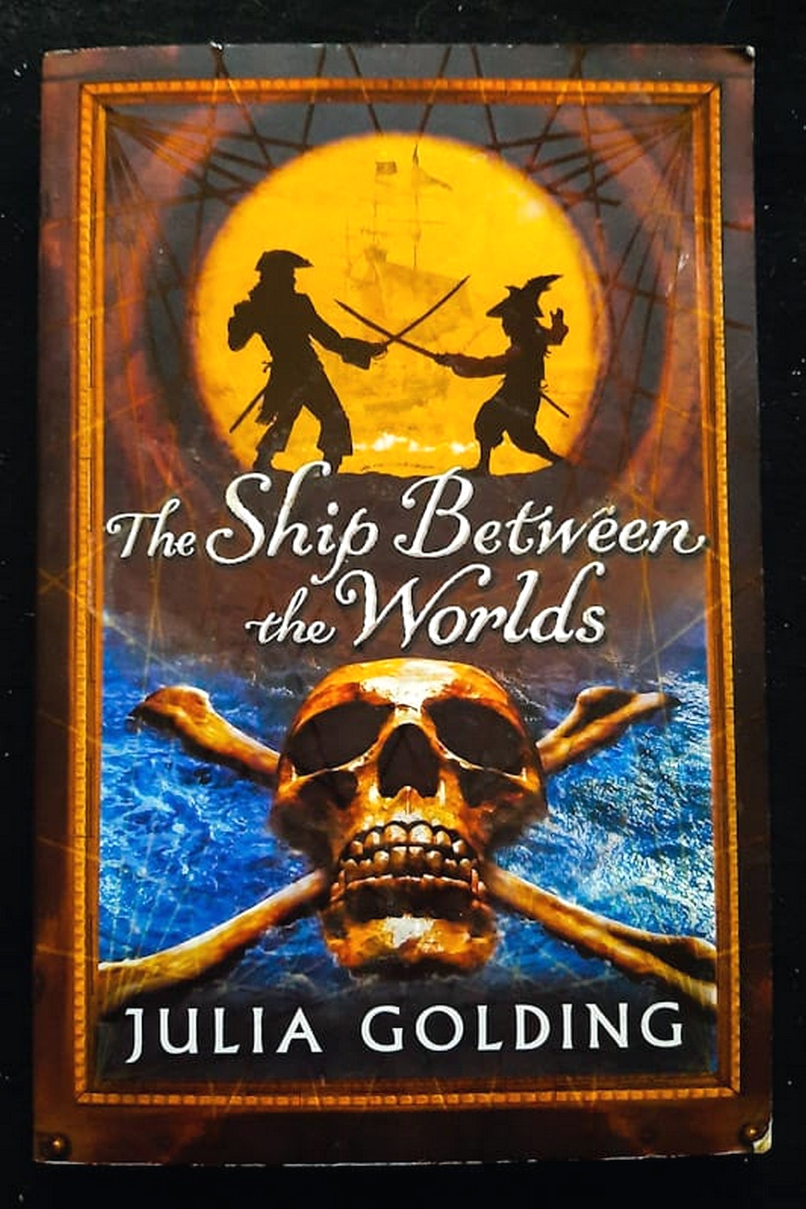 Front Cover Of Bestselling Book The Ship Between The Worlds (Julia Golding
)